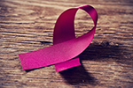 A pink ribbon signifying support for those with breast cancer