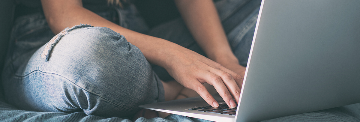 Digital Interventions to Prevent Substance Use among Adolescents girl typing on laptop